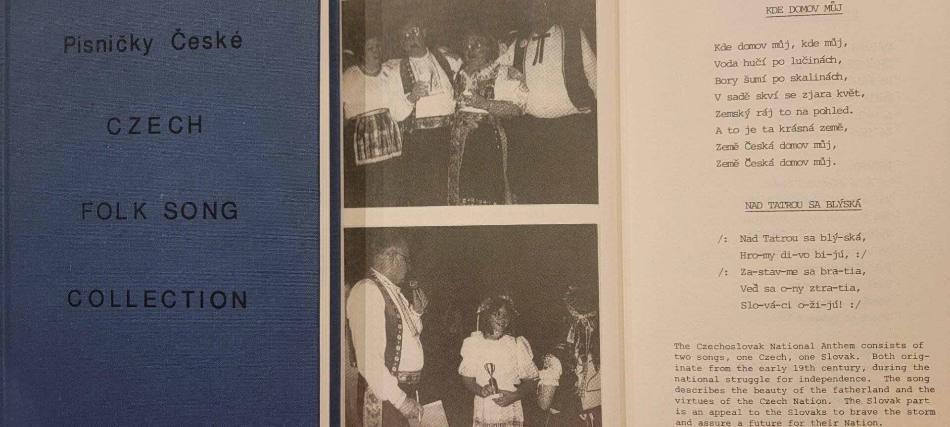 A black and white photo of people in native dress.